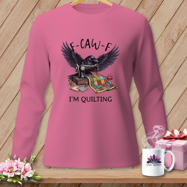 Raven at sewing machine with quilt. "F-CAW-F I'M QUILTING" text.