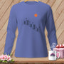 Periwinkle long-sleeve shirt with thread spools and button graphic.
