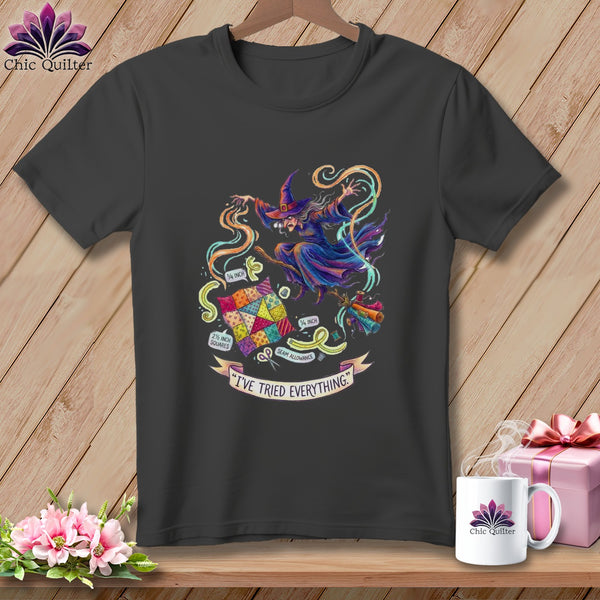 Witch on broom with quilt squares, measuring tape, and thread. Text: "I'VE TRIED EVERYTHING."