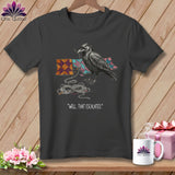 Dark t-shirt with a crow holding thread and quilt pieces, 