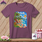 Plum-colored short-sleeve t-shirt on a wooden background, featuring a colorful coastal quilt-style graphic on the chest.