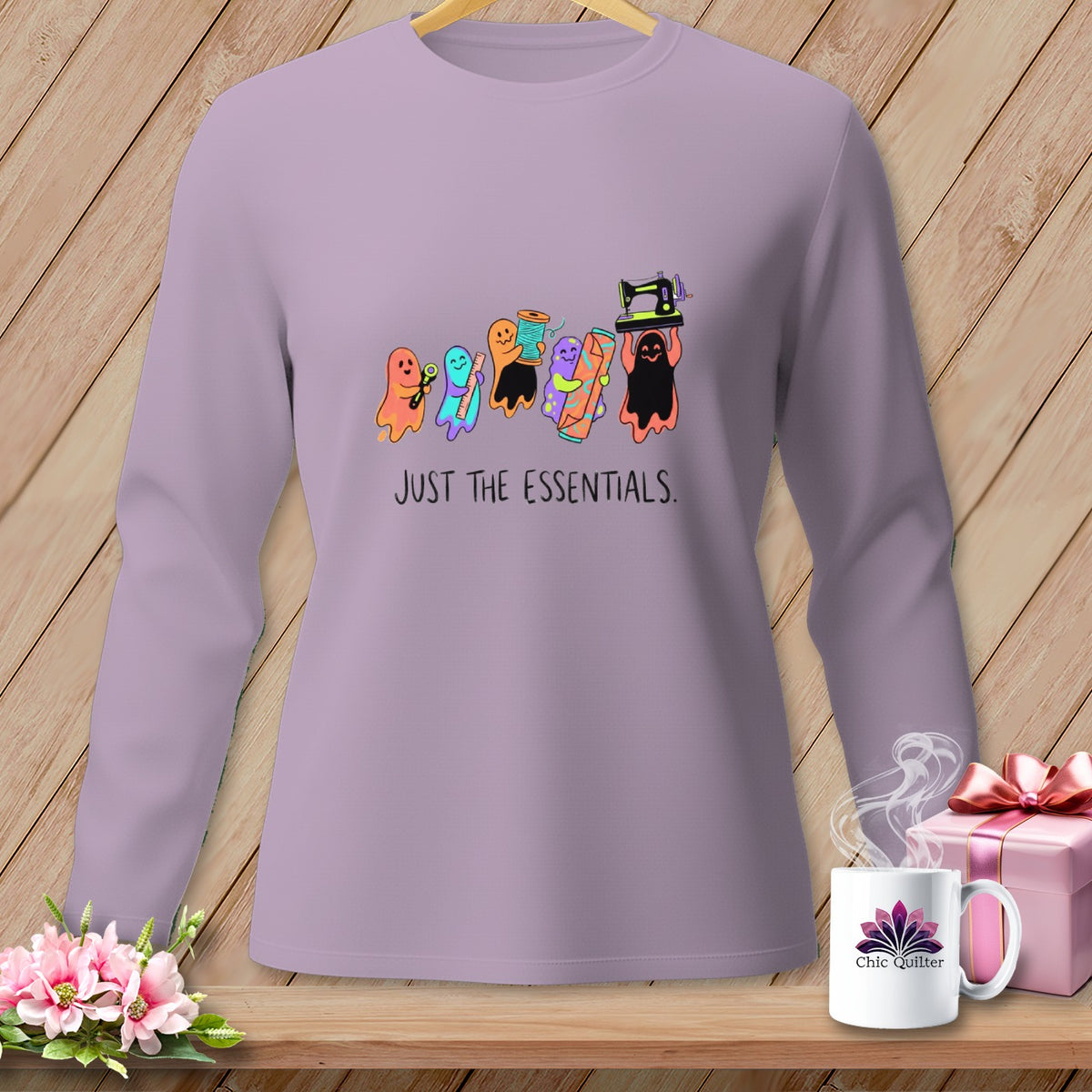Ghosts holding sewing supplies with text "JUST THE ESSENTIALS."
