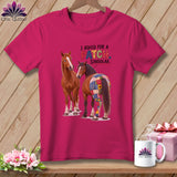 Pink t-shirt with horses and the text 