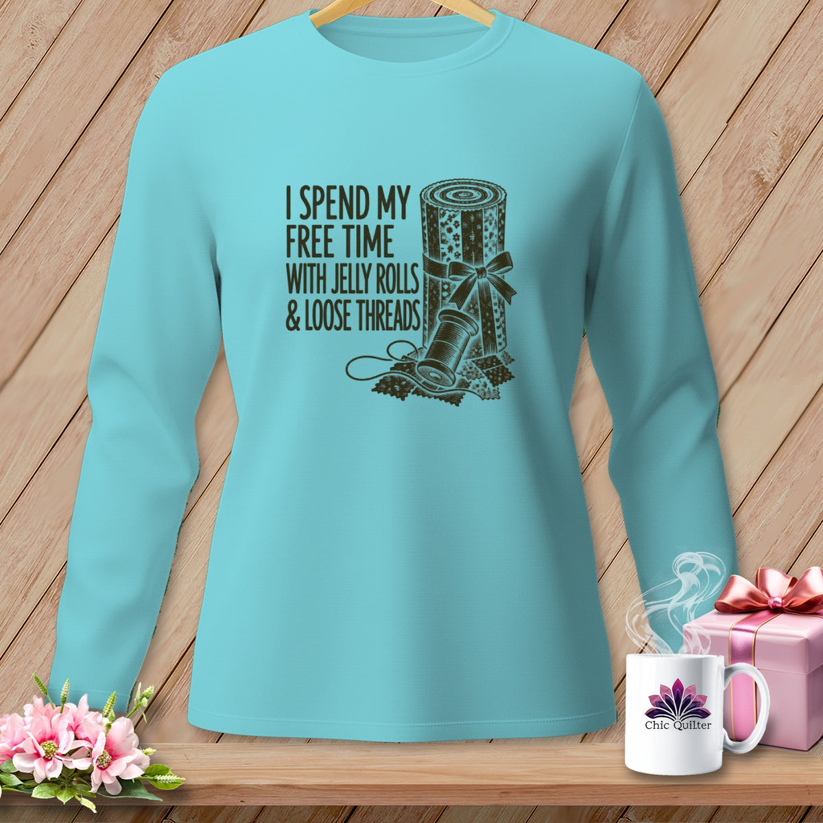 Light blue long-sleeve shirt with "I spend my free time with jelly rolls & loose threads" text.