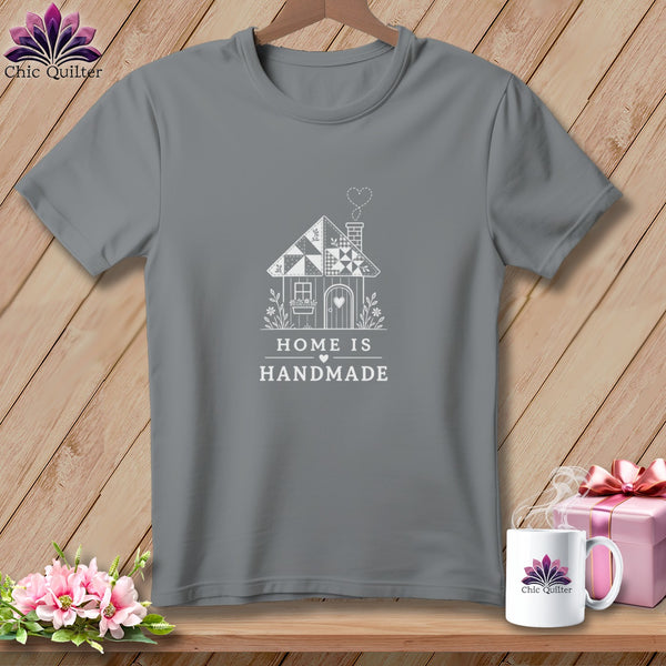 Grey t-shirt with a white graphic of a quilted house and text "HOME IS HANDMADE".