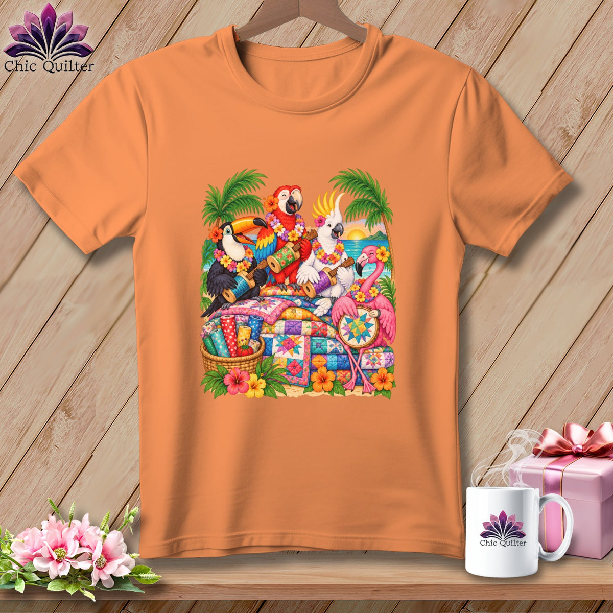 An orange t-shirt featuring a colorful graphic of tropical birds playing instruments around a quilt.