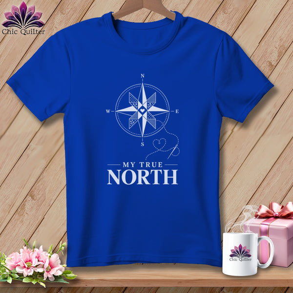 Blue t-shirt with white compass design and text "MY TRUE NORTH".