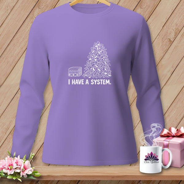 Purple long-sleeve shirt with "I HAVE A SYSTEM" graphic.