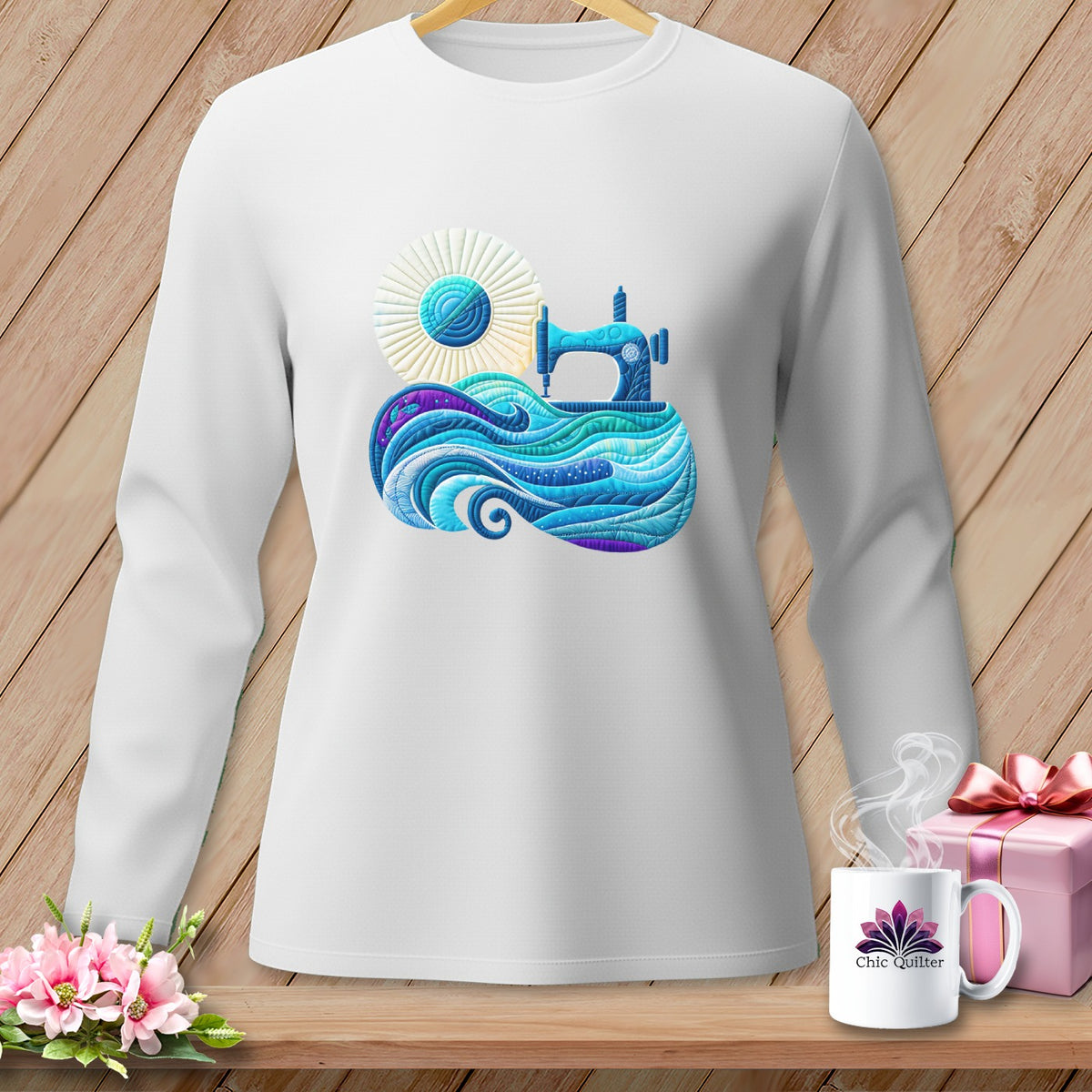 White long-sleeve shirt with a blue sewing machine and colorful waves design.