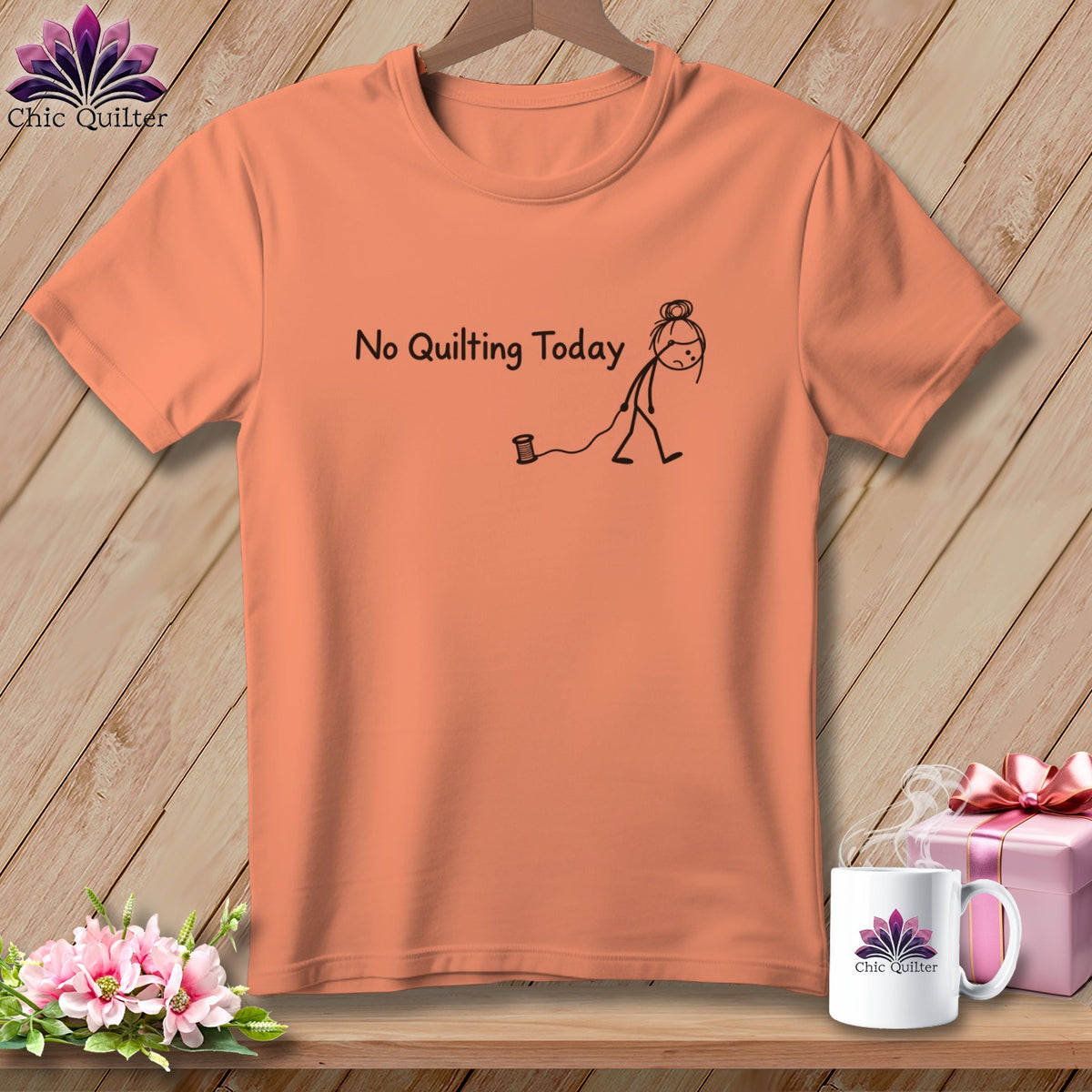 Peach t-shirt with "No Quilting Today" text and a stick figure.