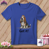 Blue t-shirt with a cartoon Basset Hound tangled in colorful yarn and the text 