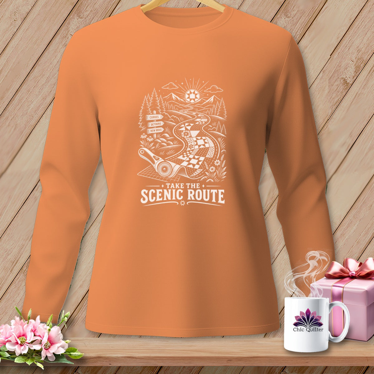 Orange long-sleeve shirt with "Take the Scenic Route" design.