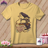Yellow t-shirt graphic with ravens, antique sewing machine, measuring tape, and scissors.