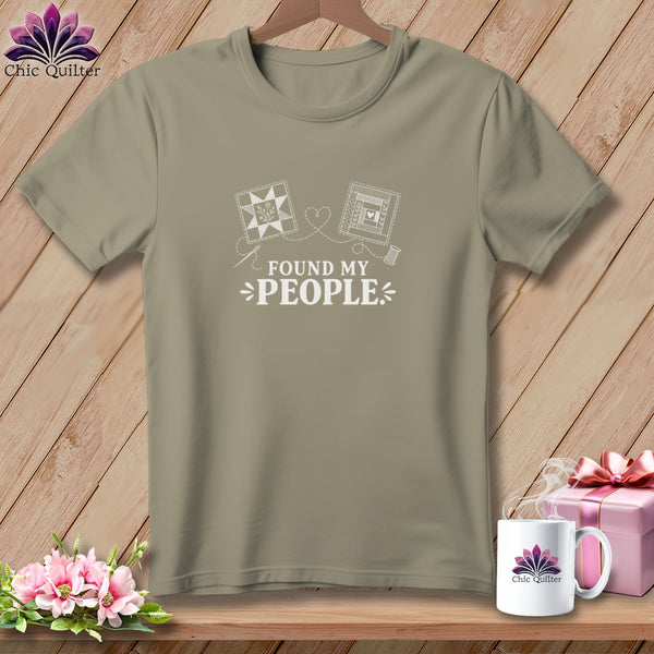 Tan t-shirt with white text and quilting graphics: "Found My People"