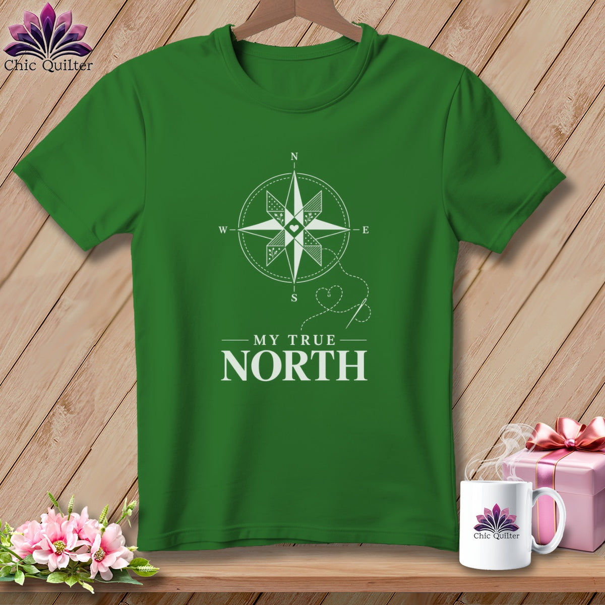 Green t-shirt with white compass graphic and "MY TRUE NORTH" text.
