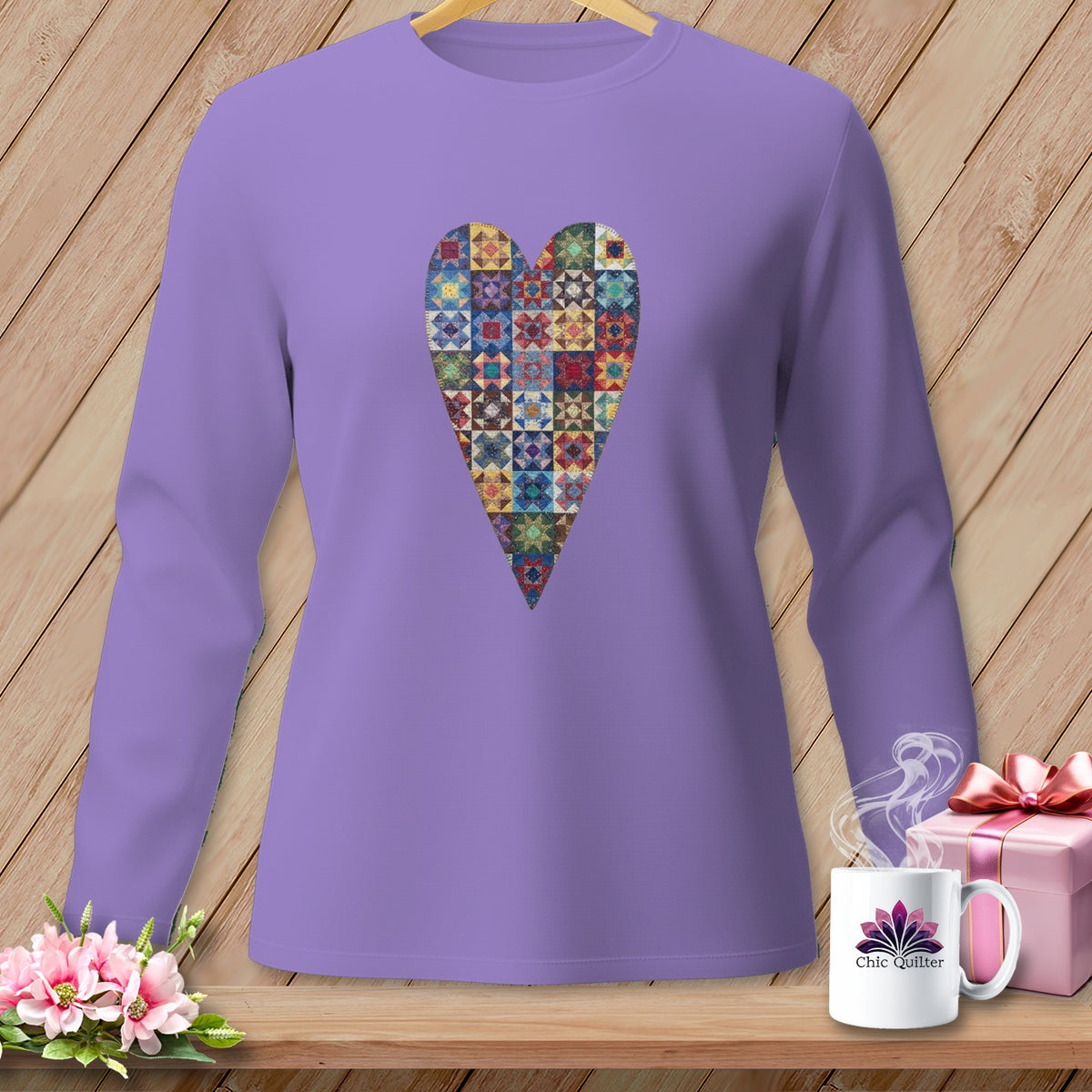 Lavender long-sleeve shirt with patchwork heart graphic and "Chic Quilter" mug.