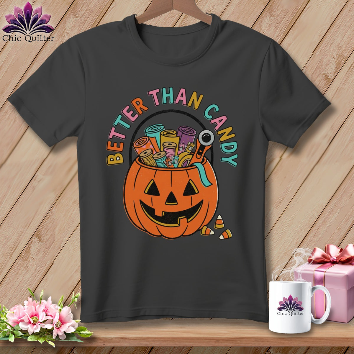 Dark grey t-shirt with Halloween pumpkin overflowing with craft supplies and text "Better Than Candy".