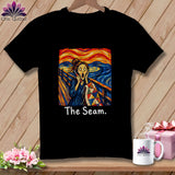 Black t-shirt featuring a quilt block and a screaming figure in the style of Munch's 