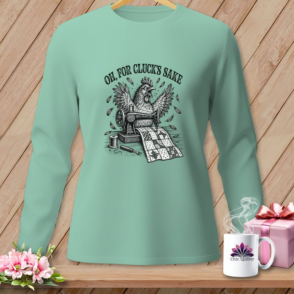 Mint long-sleeve shirt with a graphic of a chicken sewing a quilt, text "OH, FOR CLUCK'S SAKE".