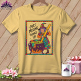Yellow t-shirt with witch illustration and text 