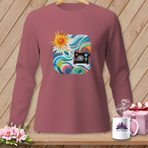 Long sleeve shirt with a colorful sewing machine and sun graphic.