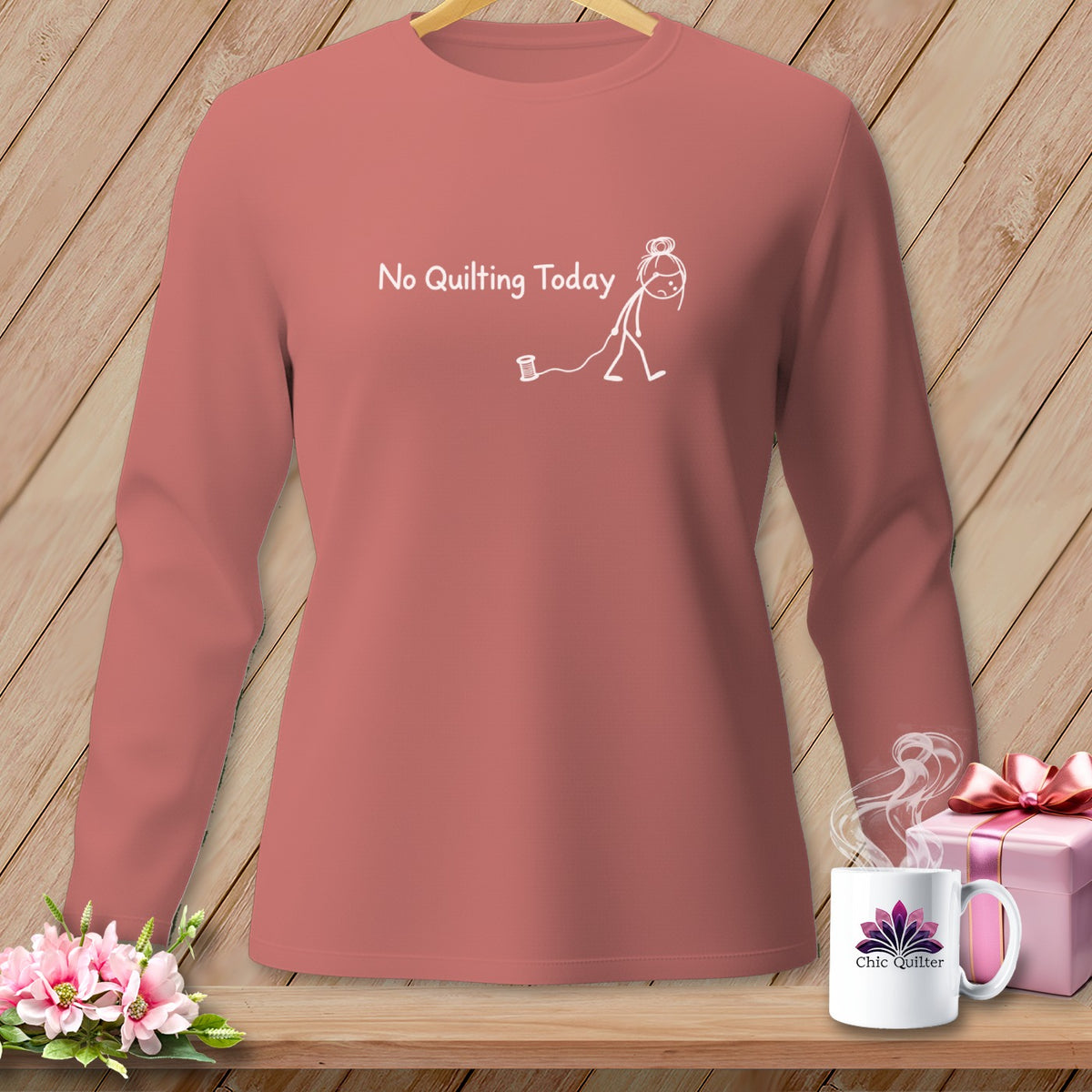Long sleeve shirt with "No Quilting Today" text and stick figure.