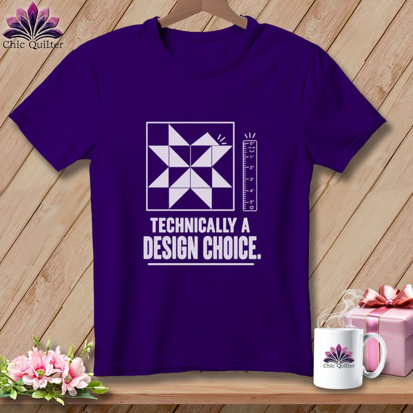 Purple t-shirt with a quilt block design and "Technically a Design Choice." text.