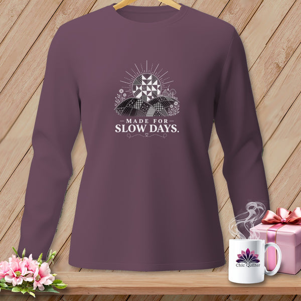 Long sleeve shirt with "Made for Slow Days" text and patchwork quilt sun design.