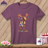 A plum-colored crewneck t-shirt featuring a whimsical cartoon moose with a quilt draped over it.