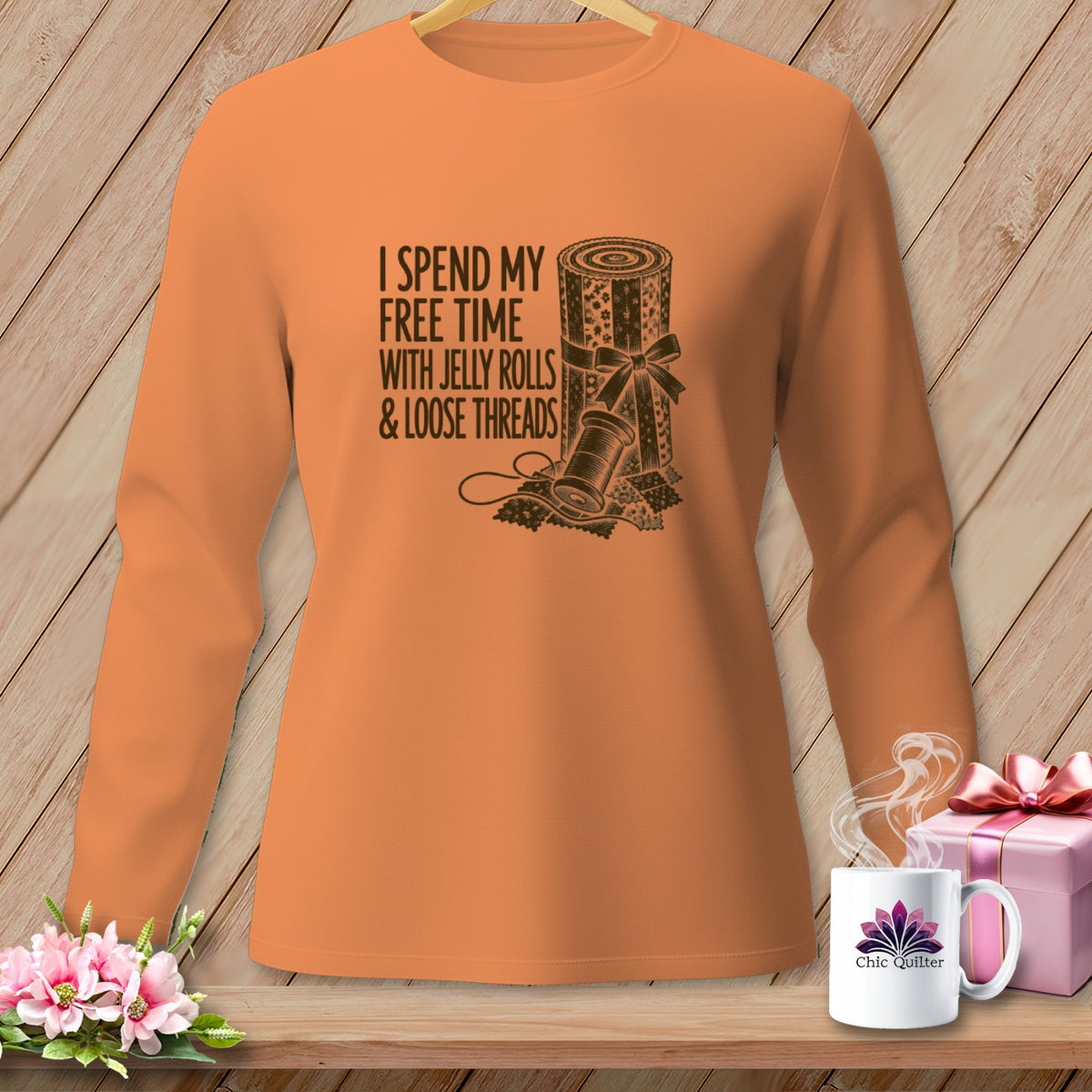 Orange long-sleeve shirt with "I Spend My Free Time With Jelly Rolls & Loose Threads" graphic.