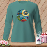 Teal long-sleeve shirt with circular graphic of sewing machine and colorful landscape.