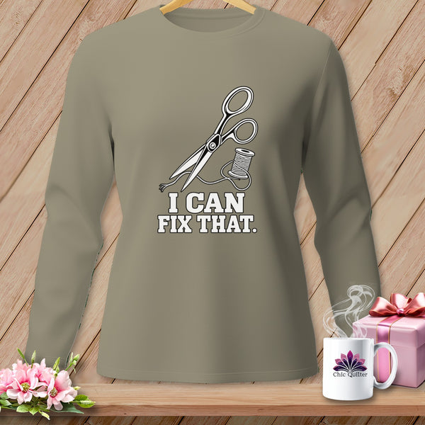 Long-sleeved shirt with scissors, thread, and text "I CAN FIX THAT."