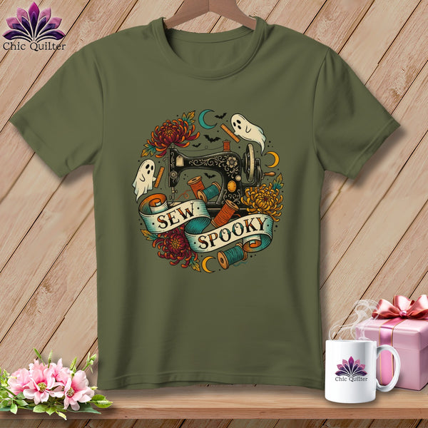 Olive green t-shirt with "Sew Spooky" text, sewing machine, ghosts, and flowers.