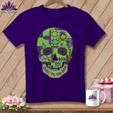 Purple t-shirt with a quilted skull graphic that reads 