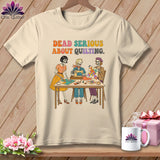 T-shirt graphic with three skeletons sewing and quilting, reading 