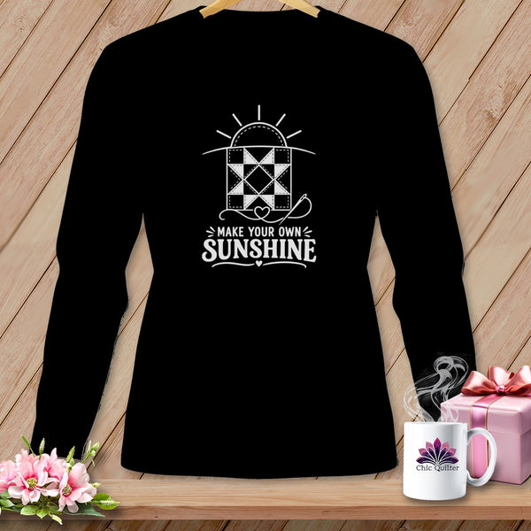 Black long sleeve shirt with "Make Your Own Sunshine" text and quilt graphic.