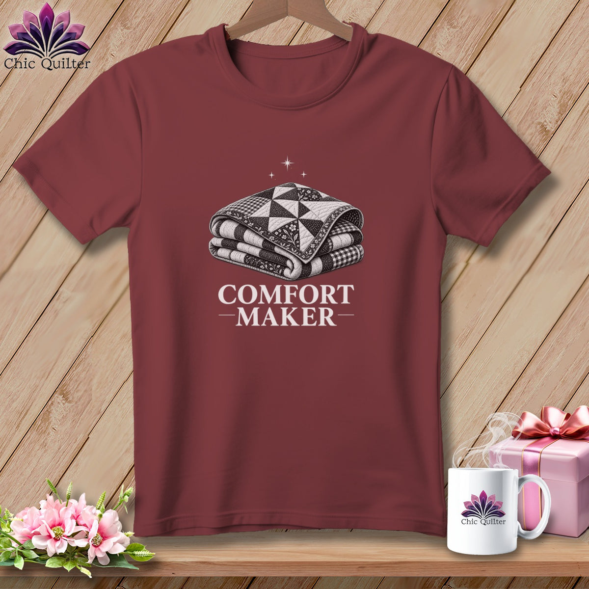 Maroon t-shirt with "Comfort Maker" text and stacked quilt design.