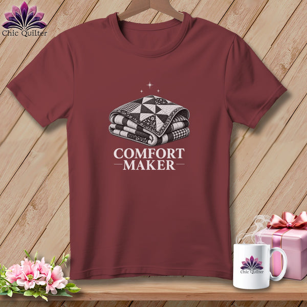 Maroon t-shirt with "Comfort Maker" text and stacked quilt design.