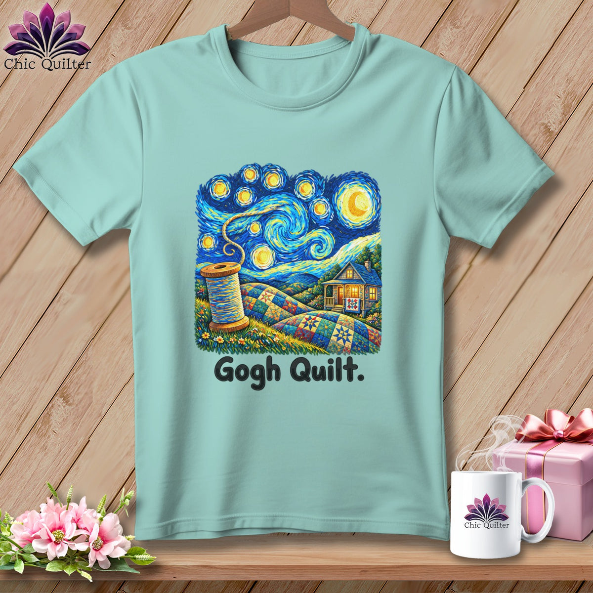 Light blue t-shirt with a quilting design inspired by Starry Night, featuring a spool of thread.