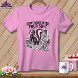 Pink t-shirt with a skunk, fabric, and 