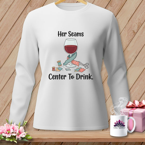 White long-sleeve shirt with "Her Seams Center To Drink" graphic.