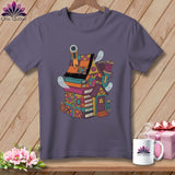 Quilted house on books with ghosts and sewing notions, Chic Quilter logo on mug.