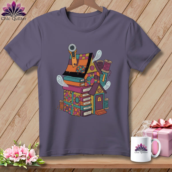 Quilted house on books with ghosts and sewing notions, Chic Quilter logo on mug.