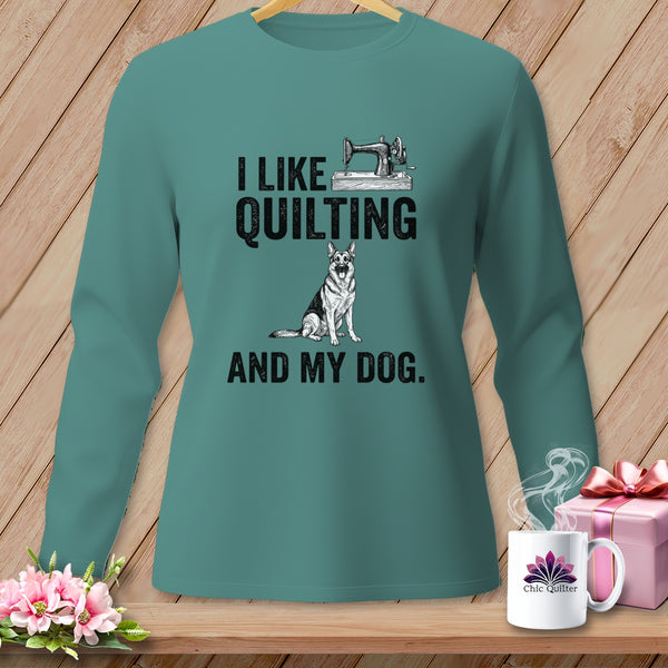Teal long-sleeve shirt with "I Like Quilting and My Dog" text and dog graphic.