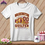 White t-shirt featuring a quilting graphic with text reading Washington Quilter and a pincushion, scissors, and spools.