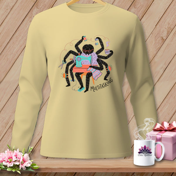 Spider at sewing machine with scissors and coffee, text "MULTITASKING"