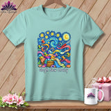 Light blue t-shirt with a whimsical sewing-themed print in a Van Gogh style, reads 