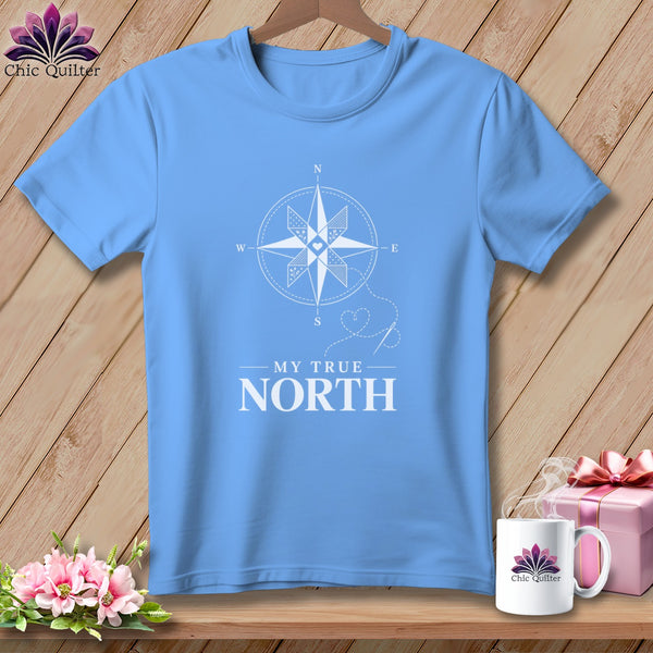 Light blue t-shirt with a white compass graphic and "MY TRUE NORTH" text.