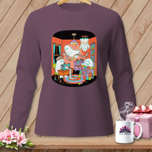 Ghosts sew and hang around a sewing machine on a shirt with "Night Shift" text.