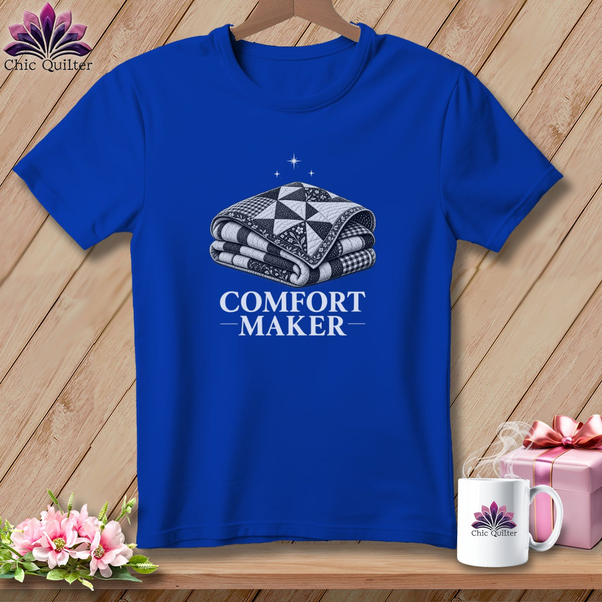 Royal blue t-shirt with a folded quilt graphic and the text "COMFORT MAKER".